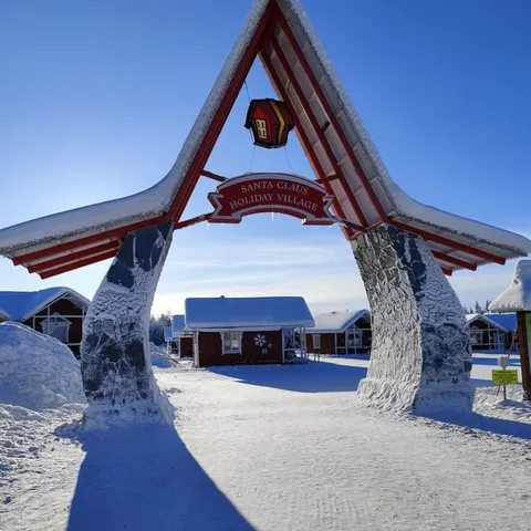The archway at Santa Claus Village in the snow